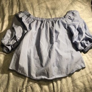 Stripped blouse with sleeveless look